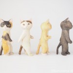 歩く木彫り猫さんたち